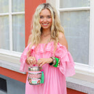 Boho-Tiffin Kiss and Snake stainless steel 3-tier lunchbox with leopard, lip, and snake print held by a smiling woman